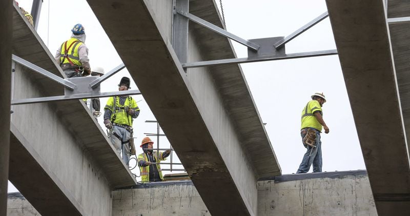 April 24, 2017 Atlanta: Construction workers continued to make progress on the I-85 bridge.  JOHN SPINK /JSPINK@AJC.COM