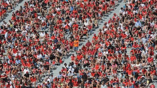 Over 10,000 football fans sit and watch the Black Team vs the Red Team during the UGA Spring football Football Game in Sanford Stadium at the University of Georgia on Saturday, April 14,2012. The Red team won 32 to 31.