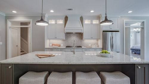 Pendant lights, still most popular over kitchen islands and breakfast bars, are taking on new shapes and styles. CONTRIBUTED BY SR Homes