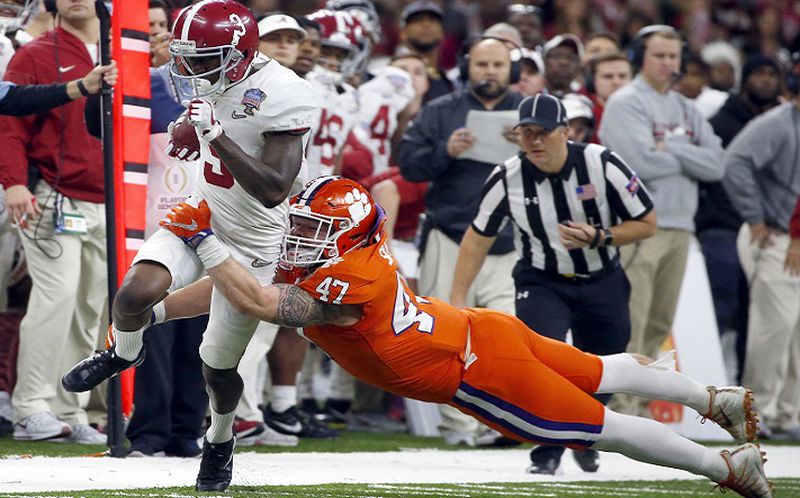 FILE - In this Monday, Jan. 1, 2018, file photo, Alabama wide receiver Calvin Ridley (3) is tackled by Clemson linebacker James Skalski (47) in the first half of the Sugar Bowl NCAA college football game in New Orleans. Ridley is a likely first-round NFL draft pick regarded as one of the nation's best at his position, but you might not have noticed watching the fourth-ranked Crimson Tide's last couple of games. Georgiaâs Javon Wims and Terry Godwin have yielded much of the spotlight to the Bulldogs heralded tailbacks also going into the Monday, Jan. 8, 2018, College Football national championship game. (AP Photo/Butch Dill, File)