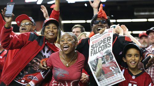 Ah, those were the days: Falcons fans celebrate last season's NFC Championship victory over Green Bay, and an upcoming trip to the Super Bowl. (Curtis Compton/ccompton@ajc.com)