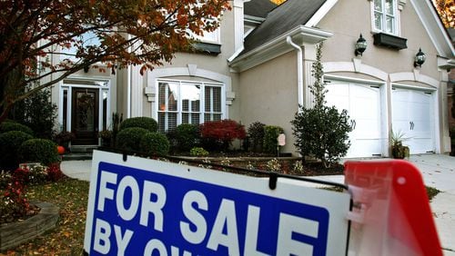 Home sales often ride with the economy, but Atlanta sales grew even while thousands lost their jobs. (AJC file photo).