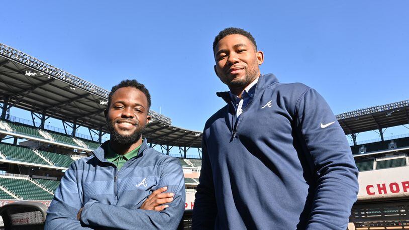 Jeremy Dorsey (left) and Terrence Pinkston -- former and current participants, respectively, in the Braves' "Bill Lucas Fellowship" program, at Truist Park on Wednesday. (Hyosub Shin / Hyosub.Shin@ajc.com)