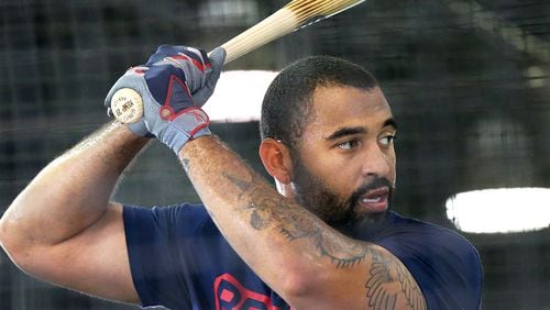 Matt Kemp, who reported to camp earlier this week in improved condition, took some swings in the batting cage Thursday morning before going onto the field and hitting some towering shots over a 60-foot all in center field. (Curtis Compton/ccompton@ajc.com)