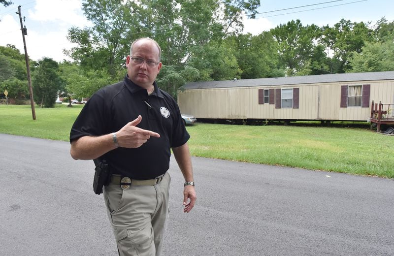 July 12, 2019 Milledgeville - Capt. Brad King with Baldwin County Sheriff’s Office shows areas, where they have had gang activity, such as drive-by shootings, in Milledgeville on Friday, July 10, 2019. A statewide push to crack down on gangs could lead to serious changes in how criminal justice looks, especially in rural parts of Georgia, where authorities say the groups have taken hold in recent years. Officials at the FBI, the GBI and local agencies say the efforts are necessary because national gangs have increasingly recruited locals and expanded networks for criminal activity in cities and small towns all over the state in the past decade or so. (Hyosub Shin / Hyosub.Shin@ajc.com)