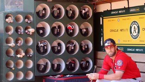 Bryce Harper sits in the dugout before the Nationals' game against the Oakland Athletics at Oakland Coliseum on June 4, 2017 in Oakland.