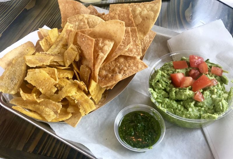 Chiringa offers a menu inspired by chiringuitos, open-air restaurants and bars that dot coastal beaches in Spain. For a quick, easy nosh, order the guacamole. It comes with thick-cut fried corn tortilla chips or fried plantain chips. LIGAYA FIGUERAS / LFIGUERAS@AJC.COM