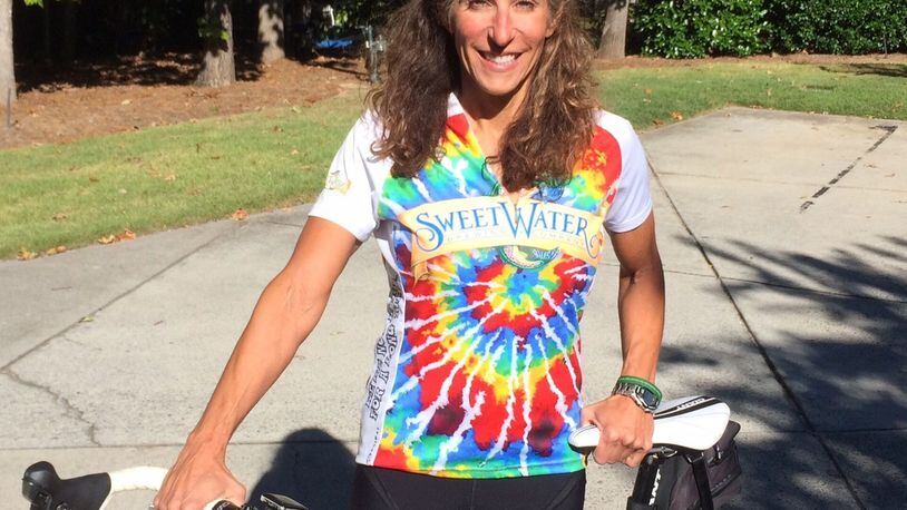 Diane Davis was on a 100-mile charity bicycle ride when she was blasted in the face with a fire extinguisher by a passing goober. (Photo by Bill Torpy / btorpy@ajc.com)