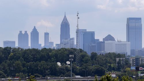 The skyline of downtown Atlanta is visible near Lindbergh on Thursday, Aug. 12, 2021. (Christine Tannous / christine.tannous@ajc.com)