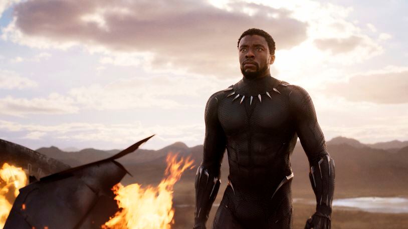 This image released by Disney and Marvel Studios' shows Chadwick Boseman in a scene from "Black Panther," in theaters on Feb. 16, 2018. (Marvel Studios/Disney via AP)