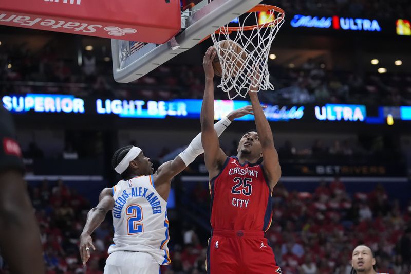 New Orleans Pelicans guard Trey Murphy III (25) goes to the basket against Oklahoma City Thunder guard Shai Gilgeous-Alexander (2) in the first half of Game 3 of an NBA basketball first-round playoff series in New Orleans, Saturday, April 27, 2024. (AP Photo/Gerald Herbert)