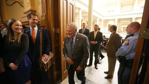Gov. Nathan Deal enters the budget committee room to speak to lawmakers in January.