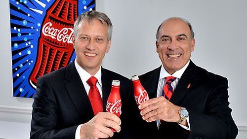 Muhtar Kent (right), Coca-Cola’s chief executive officer and chairman, and Coca-Cola President James Quincey, who will soon be stepping in as CEO, both got big raises last year despite lower profits. Photo: Coca-Cola.