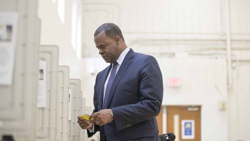 12/05/2017, Atlanta, GA, - Atlanta mayor Kasim Reed casts his vote for the Atlanta mayoral run-off election at Fickett Elementary School, Tuesday, December 5, 2017. A few days later, the mayor threatened unsuccessful mayoral candidate Mary Norwood with legal action because of accusations that his campaign manipulated voters in 2009. ALYSSA POINTER/ALYSSA.POINTER@AJC.COM