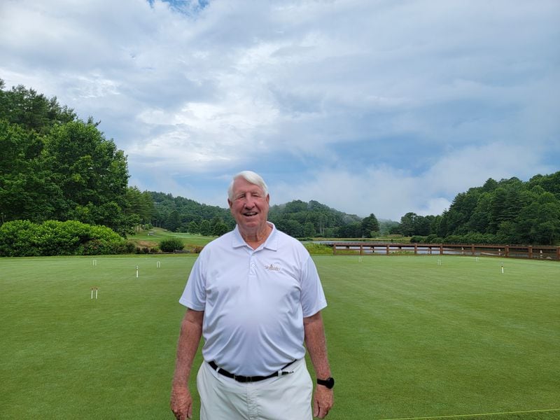 Sky Valley Country Club member Lee Robinson, 74, on the club’s croquet lawn. Robinson plays often and credits the game with helping him get his steps in and socialize.