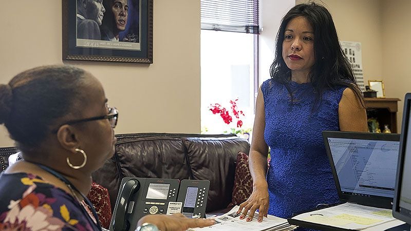 Georgia Rep. Brenda Lopez Romero, D-Norcross (right) speaks with administrative assistant JC Bryant in her office at the Coverdell Legislative Office Building in Atlanta on Thursday, July 18, 2019. ALYSSA POINTER/ALYSSA.POINTER@AJC.COM