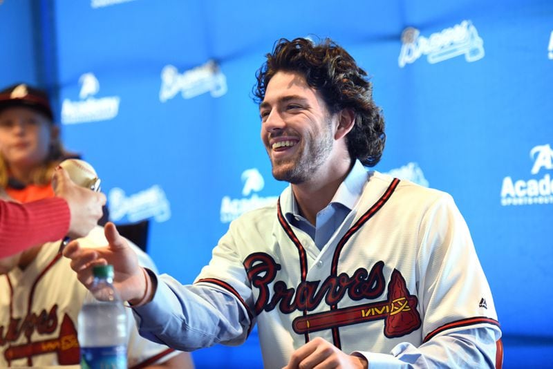 Shortstop Dansby Swanson, the Braves' top-rated prospect according to Baseball Prospectus, signs autographs for fans during Saturday's FanFest at Turner Field. HYOSUB SHIN / HSHIN@AJC.COM