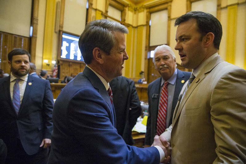 Gov. Brian Kemp, left, shakes hands with state Sen. Burt Jones, who was part of a group of state lawmakers who wrote a letter to Vice President Mike Pence urging him to delay the certification of the Electoral College vote. Jones and the others never sent the letter, he said, because they “saw the writing on the wall.” But Jones is still trying to appeal to President Donald Trump's base of supporters in Georgia, calling for changes in the state's election laws. “There was an element of voters out there who felt disenfranchised by the November results, and they’re still upset,” Jones said. “If you don’t address some sort of election changes this session, the base is going to be furious.” ALYSSA POINTER/ALYSSA.POINTER@AJC.COM