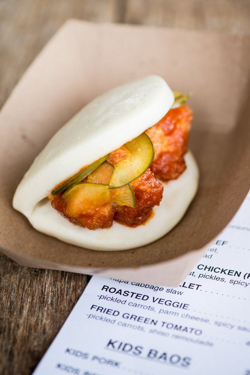 Korean Fried Chicken bao with local chicken breast, pickles, and spicy sauce. Photo credit- Mia Yakel.