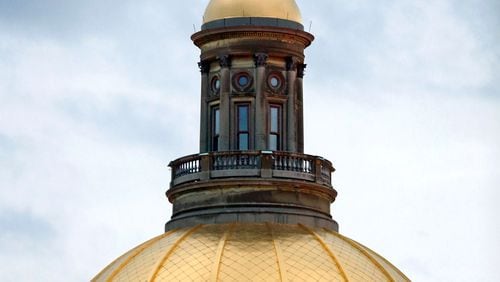 The gold dome of the Georgia State Capitol is shown at dusk Wednesday evening in Atlanta, Ga., January 9, 2013.