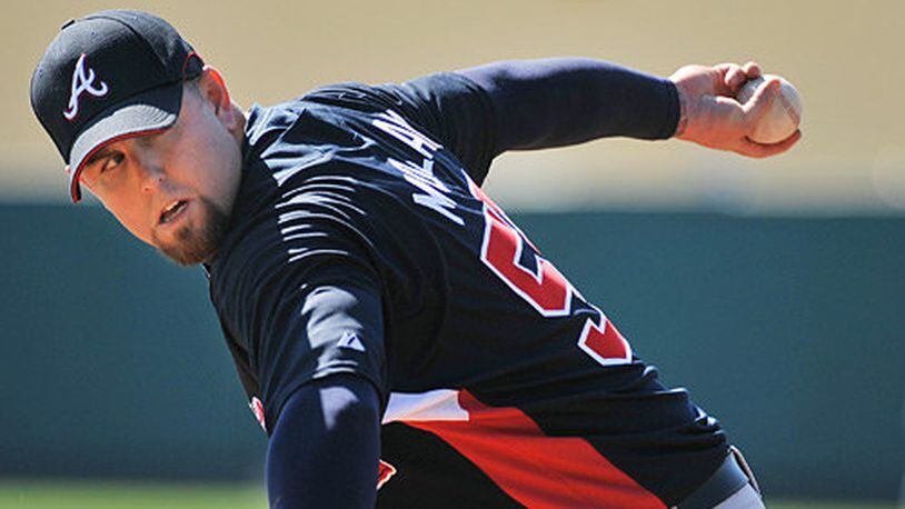 Sidearm reliever Peter Moylan, pictured during 2015 spring training when he was coming back from a second Tommy John elbow surgery, has pitched the past two seasons for Kansas City but is drawing interest again from the Braves as a free agent. (AJC file photo)