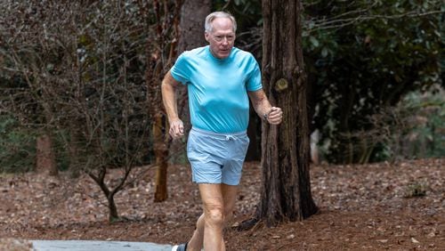 IN DECEMBER, LARRY GUZY REACHED A RECORD OF RUNNING A 10K A DAY OR THE EQUIVALENT FOR 1,000 DAYS.  PHIL SKINNER FOR THE ATLANTA JOURNAL-CONSTITUTION