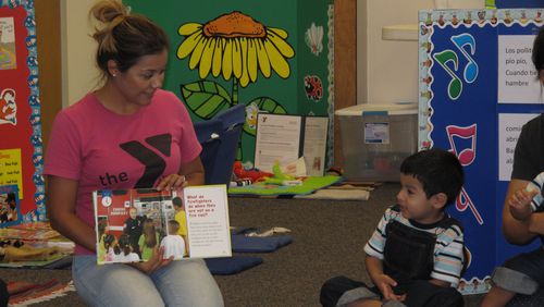 Facilitator Jennifer Beltran reads a story during circle time at the YMCA of Metro Atlanta’s Hispanic early learning program. Contributed.