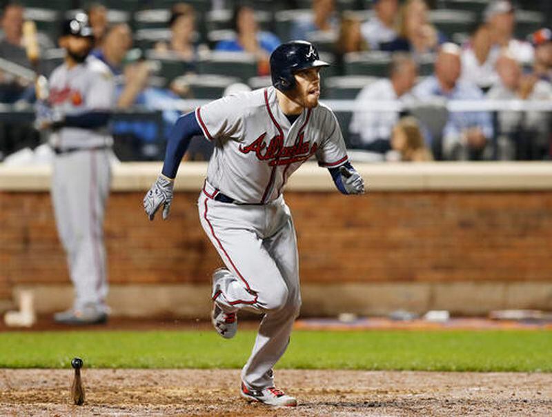 This eighth-inning single was Freddie Freeman's fourth hit in Monday's 7-3 win against the Mets, including his 31st homer of the season and his 41st double. (AP Photo/Kathy Willens)