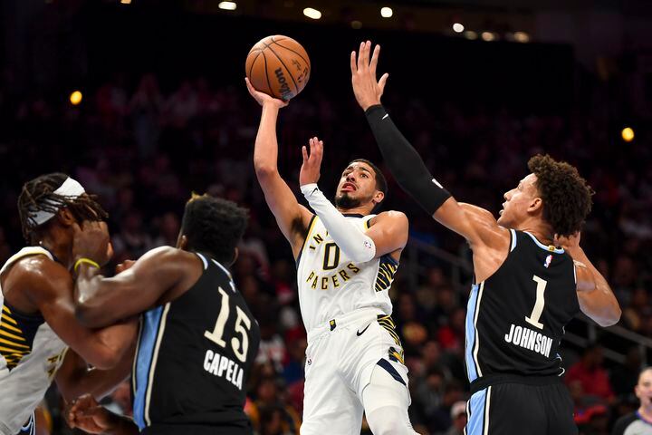 Indiana Pacers guard Tyrese Haliburton (0) makes a shot against the Atlanta Hawks during the first half of an NBA game Tuesday, November 21, 2023. (Daniel Varnado/For the AJC)