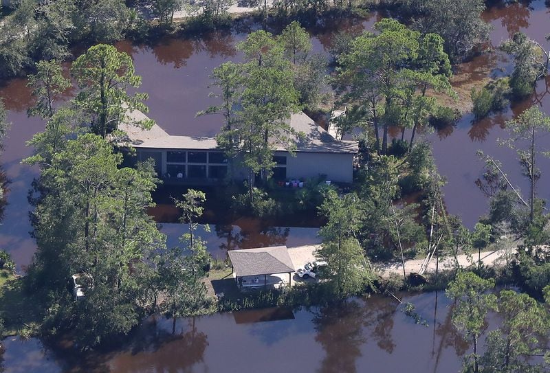 A home on St. Simons Island, on the Georgia coast, is surrounded by water following Hurricane Irma on Tuesday. Curtis Compton/ccompton@ajc.com