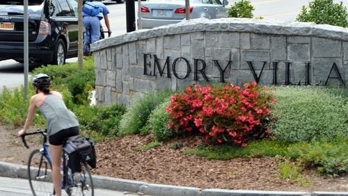 Picture shows a traffic circle, and shops and restaurants in Emory Village near an entrance to Emory University in Atlanta on Thursday, July 31, 2014. HYOSUB SHIN / HSHIN@AJC.COM
