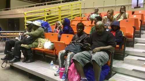 Gloria Hayes and Demetri White, front right, are among the last groups of people being bused out of Savannah ahead of Hurricane Irma. Photo: Jennifer Brett