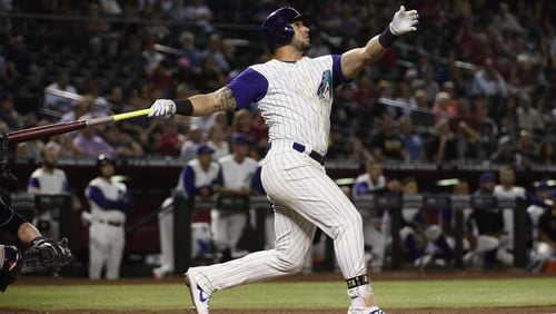 David Peralta of the Arizona Diamondbacks hits a solo home run in the ninth inning against the Atlanta Braves at Chase Field on May 9, 2019 in Phoenix