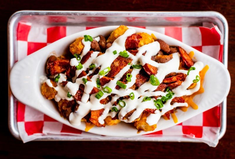 For a taste of Louisiana, try the totchos (aka loaded tater tots) with red beans, andouille, scallions, cheddar cheese and sour cream at Lagarde American Eatery. CONTRIBUTED BY HENRI HOLLIS