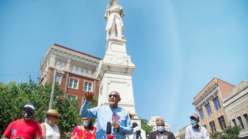 Former mayor Jack Ellis speaks to the media out front of the Confederate statue June 12, 2020, at the corner of Second St. and Cotton Ave. in Macon, to ask the city to move the state to Rose Hill Cemetery. (Jason Vorhees / The Telegraph)