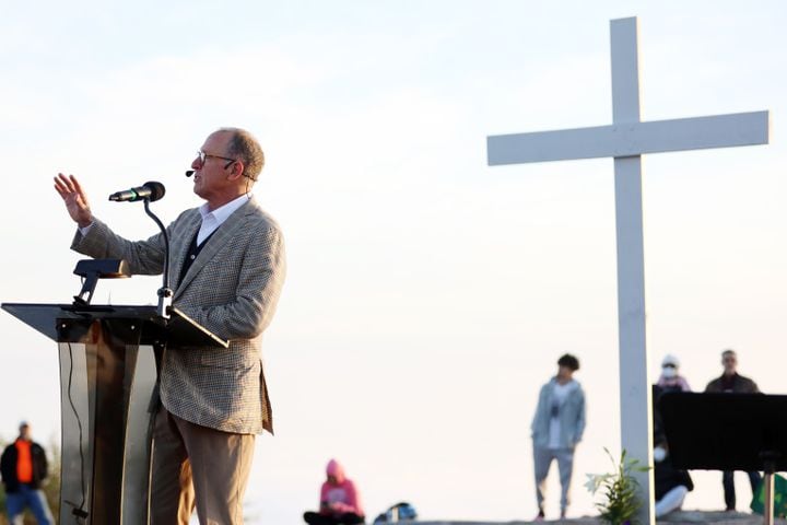 Pastor Bryant Wright delivers the message at the top of Stone Mountain during the 76th annual Easter Sunrise Service on Sunday, April 17, 2022. The popular event returned to the park after a two-year hiatus because of the pandemic. Miguel Martinez/miguel.martinezjimenez@ajc.com