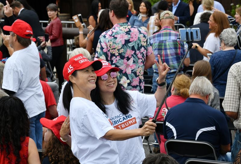 September 15, 2020 Cumming - Supporters take a selfie as they wait before President Donald Trump's son, Eric Trump is scheduled to speak as part of the 'Evangelicals for Trump: Praise, Prayer, and Patriotism' event at Reid Barn in Cumming on Tuesday, September 15, 2020. Other guests include Pastor Paula White, Pastor Jentezen Franklin, Dr. Alveda King, Pastor Todd Lamphere, and Pastor Tony Suarez. (Hyosub Shin / Hyosub.Shin@ajc.com)
