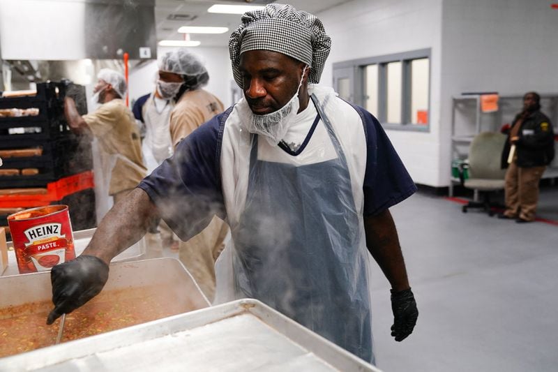 Inmate Joseph Wheat is seen in the kitchen during a tour of the Fulton County Jail on Monday, December 9, 2019, in Atlanta. (Elijah Nouvelage/Special to the Atlanta Journal-Constitution)