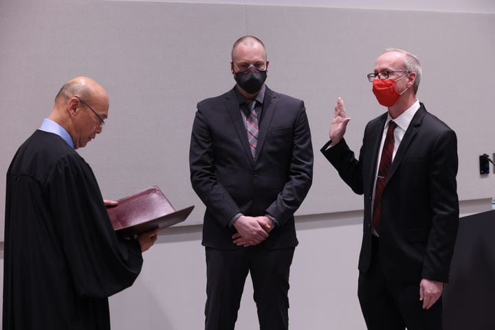 Dekalb County State Court Judge Alvin T. Wong swore in Brian Mock as the new Chamblee Mayor on Thursday, January 13, 2022. Miguel Martinez for The Atlanta Journal-Constitution
