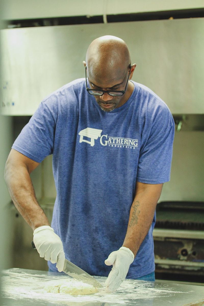 Terrance Mouzon of Decatur doesn’t think he’ll turn to baking as a career. But learning to make Gathering Industries standards such as scones and power bars teaches him the importance of teamwork and taking pride in a job well done. (HaydnCorine Media)