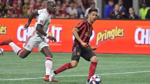 October 30, 2019 Atlanta - Atlanta United midfielder Gonzalo Martinez (10) assists a pass to Atlanta United defender Julian Gressel (24) to score a goal in the first half during the Eastern Conference Final soccer match at Mercedes-Benz Stadium on Wednesday, October 30, 2019. (Hyosub Shin / Hyosub.Shin@ajc.com)