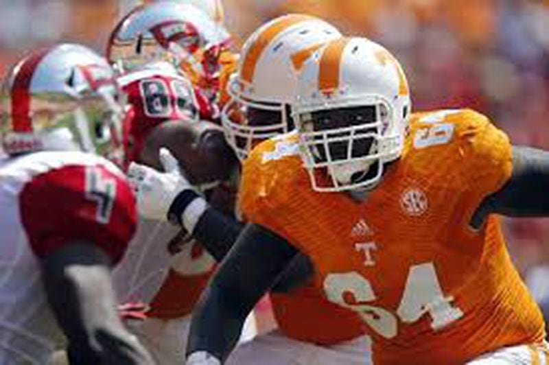 Tennessee offensive lineman James Stone (64) has signed with the Falcons. (Photo by Associated Press)