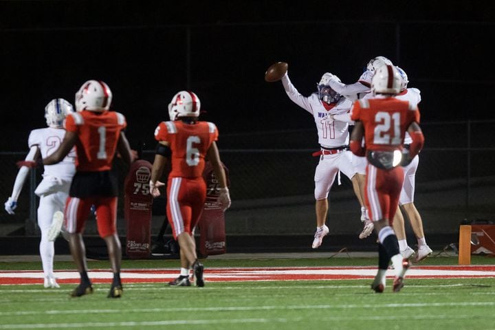 Walton's Nate Lyons (11) celebrates a touchdown during a GHSA high school football playoff game between the Archer Tigers and the Walton Raiders at Archer High School in Lawrenceville, GA., on Friday, November 19, 2021. (Photo/Jenn Finch)