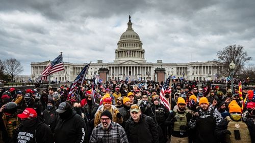 Pro-Trump protesters gather in front of the U.S. Capitol on Jan. 6, 2021. A pro-Trump mob stormed the Capitol, breaking windows and clashing with police officers. President Joe Biden accused Donald Trump and his supporters of holding a “dagger at the throat of democracy” in a forceful speech Thursday marking the anniversary of the deadly attack on the U.S. Capitol. He warned that though it didn’t succeed, the insurrection remains a serious threat to America’s system of government. (Photo by Jon Cherry//TNS)