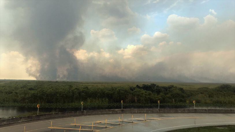 A 32,000 acre wildfire is burning through the Florida Everglades near a busy stretch of Interstate 75 known as Alligator Alley. No buildings are threatened at this time. The fire is only 30% contained.