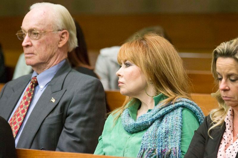 03/10/2018 -- Atlanta, GA - William "Billy" E. Corey, owner of U.S. Enterprises, left, and Dani Jo Carter, center, sit in the audience during the seventeenth day of the Tex McIver trial before Fulton County Chief Judge Robert McBurney on Tuesday, March 10, 2018. ALYSSA POINTER/ALYSSA.POINTER@AJC.COM