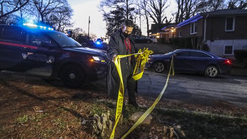 Atlanta homicide detectives on the scene of an investigation this week. (John Spink / John.Spink@ajc.com)