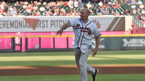 Braves great John Smoltz throws out the ceremonial first pitch before the Braves’  home game against the Washington Nationals. HYOSUB SHIN / HSHIN@AJC.COM