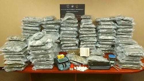 DeKalb police said Friday they seized 230 pounds of pot and arrested two people.