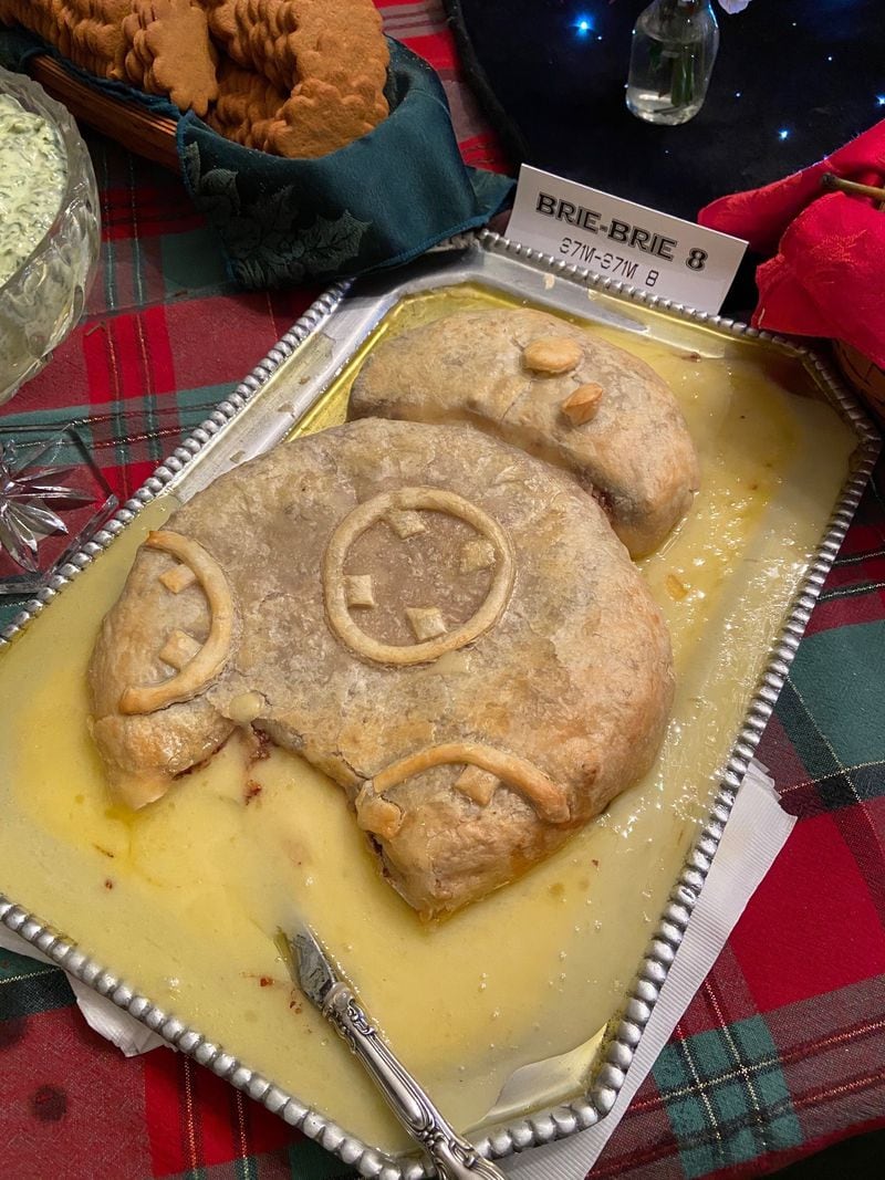 A baked brie in the shape of BB-8 is among the Star Wars-themed food at a recent party hosted by Jim and Emily Wert in anticipation of the opening of  "The Rise of Skywalker." CONTRIBUTED: MOLLY PRATT